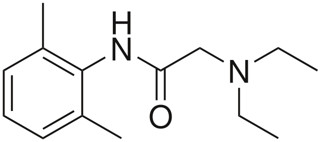 Skeletal formula of the lidocaine molecule, showing its aromatic ring, the amide link and the basic amine side group.